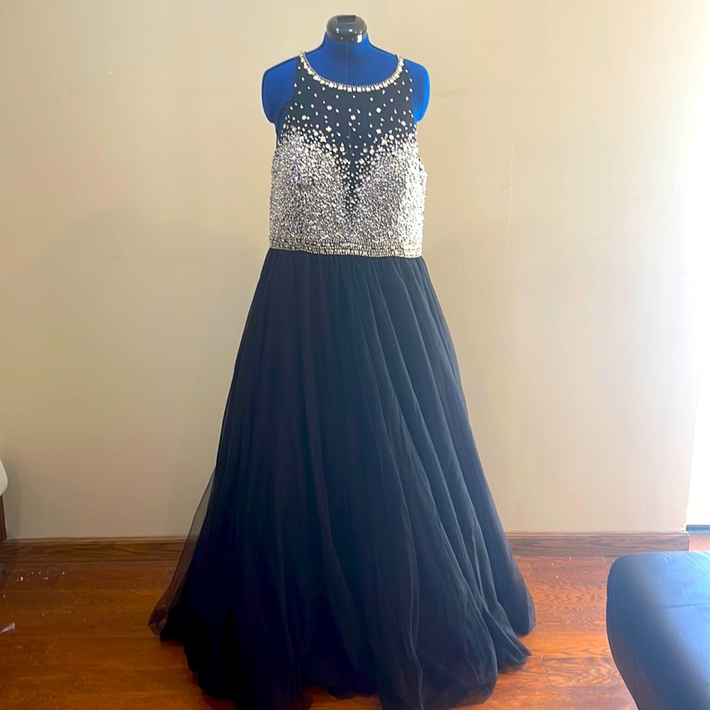 A black sleeveless halter top floor length dress